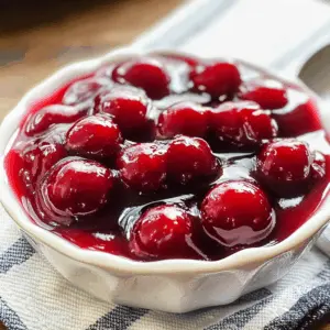 Whip up this easy Cherry Topping Sauce that adds a burst of fruity goodness to your desserts! Made with fresh cherries, a touch of sugar, and a hint of lemon, this sauce is perfect for pancakes, ice cream, or cheesecake. Save this delicious recipe to bring sweet flavor to your next brunch or dessert gathering!