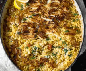 Delicious Monterey Chicken One-Pan Orzo served on a plate, featuring juicy chicken, perfectly cooked orzo, and fresh herbs.