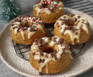 Healthy Protein Donuts with a glossy glaze and colorful toppings on a white plate